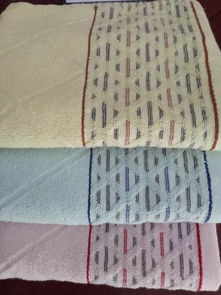 库存加长澡巾批发与一等品提花澡巾尾货促销 地摊热销的毛巾便宜批发指南